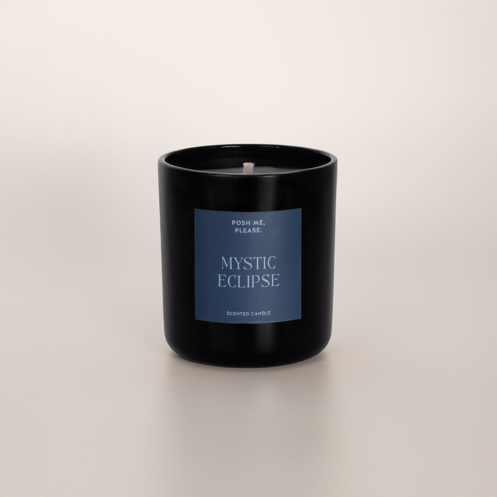 Mystic Eclipse coconut wax candle in black glass vessel, no lid, cotton wick visible