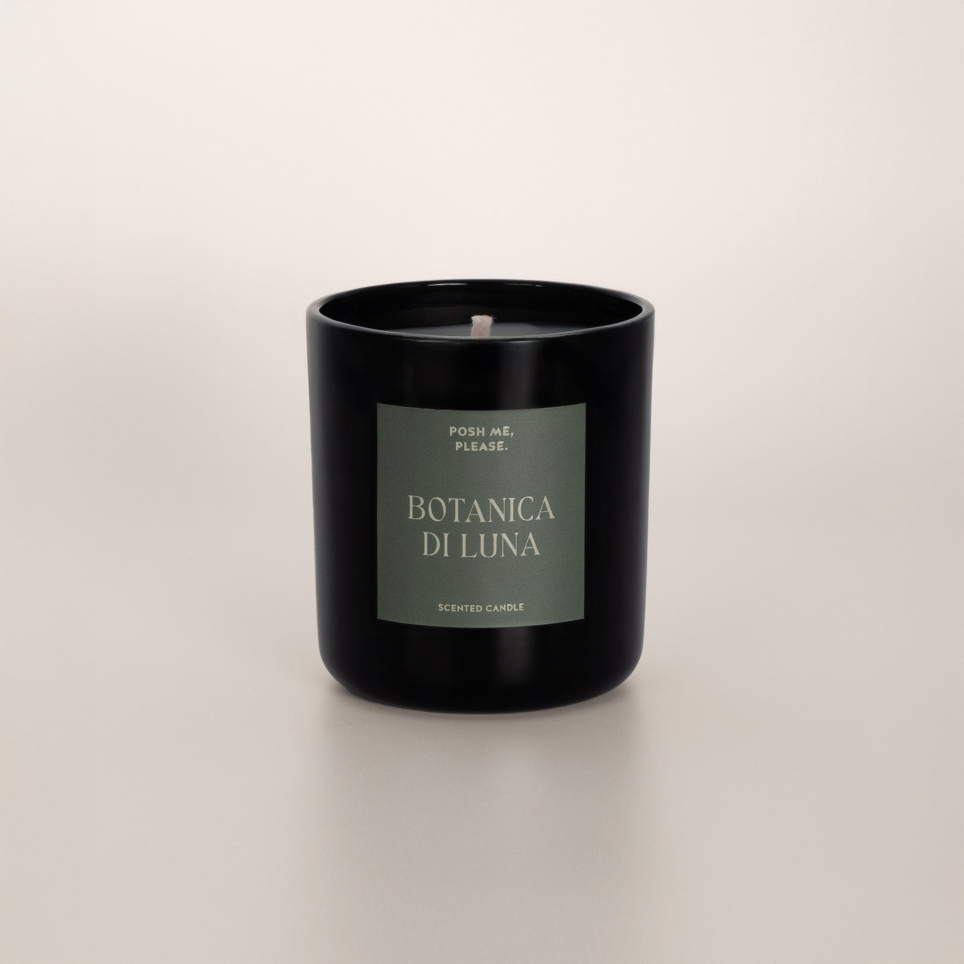 Botanica di Luna coconut wax candle in black glass vessel, no lid, cotton wick visible