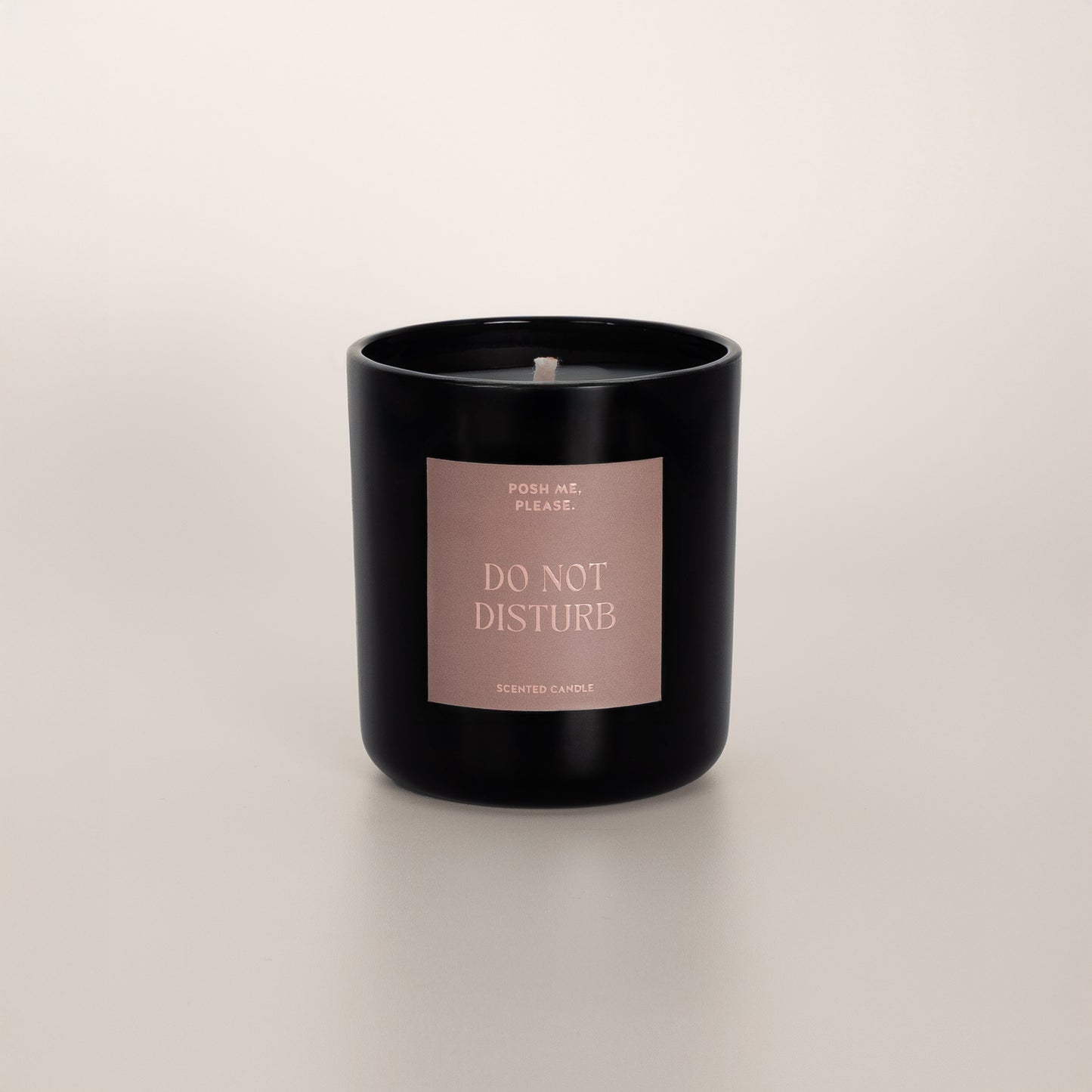Do Not Disturb coconut wax candle in black glass vessel, no lid, cotton wick visible