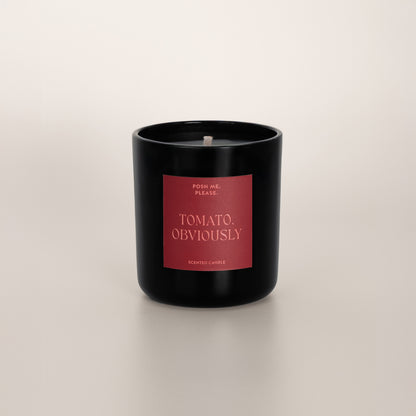 Tomato, Obviously coconut wax candle in black glass vessel, no lid, cotton wick
visible
