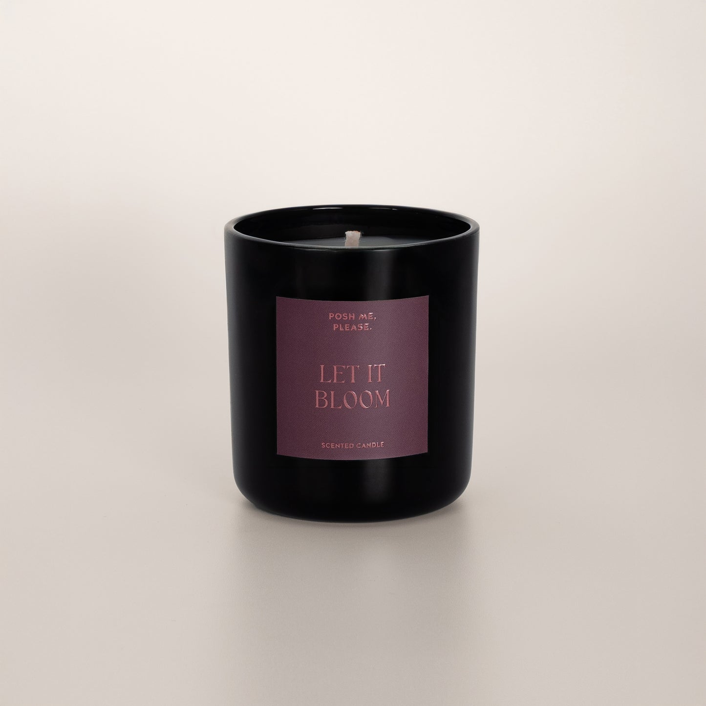Let It Bloom coconut wax candle in black glass vessel, no lid, cotton wick visible